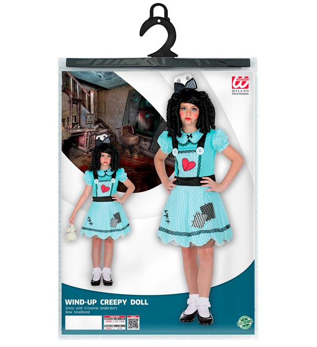Fasnachtspuppe mit buntem Kleid und roter Haarschleife als Fasnachtsaccessoire