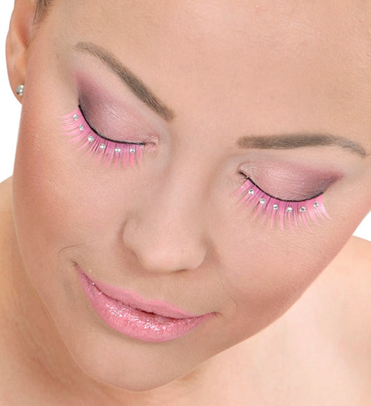 Spitze rosa Wimpern mit funkelnden Strasssteinen und Klebstoff in Glasflasche