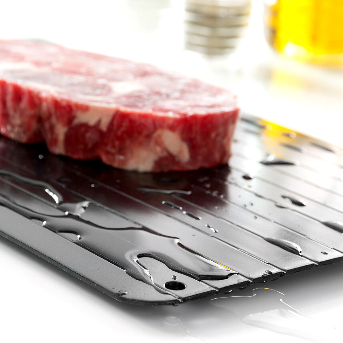 Schwarze Qheat Auftauplatte von InnovaGoods zum Auftauen von Lebensmitteln – Verpackung