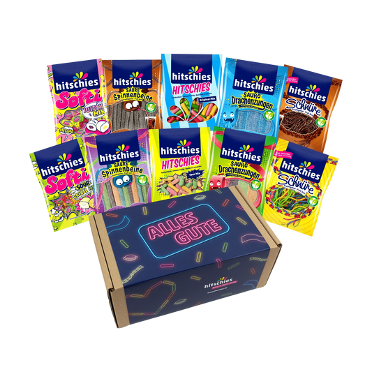 Geschenkbox mit bunten Süßigkeiten, darunter saure Spinnenbeine und verschiedene Mixe.