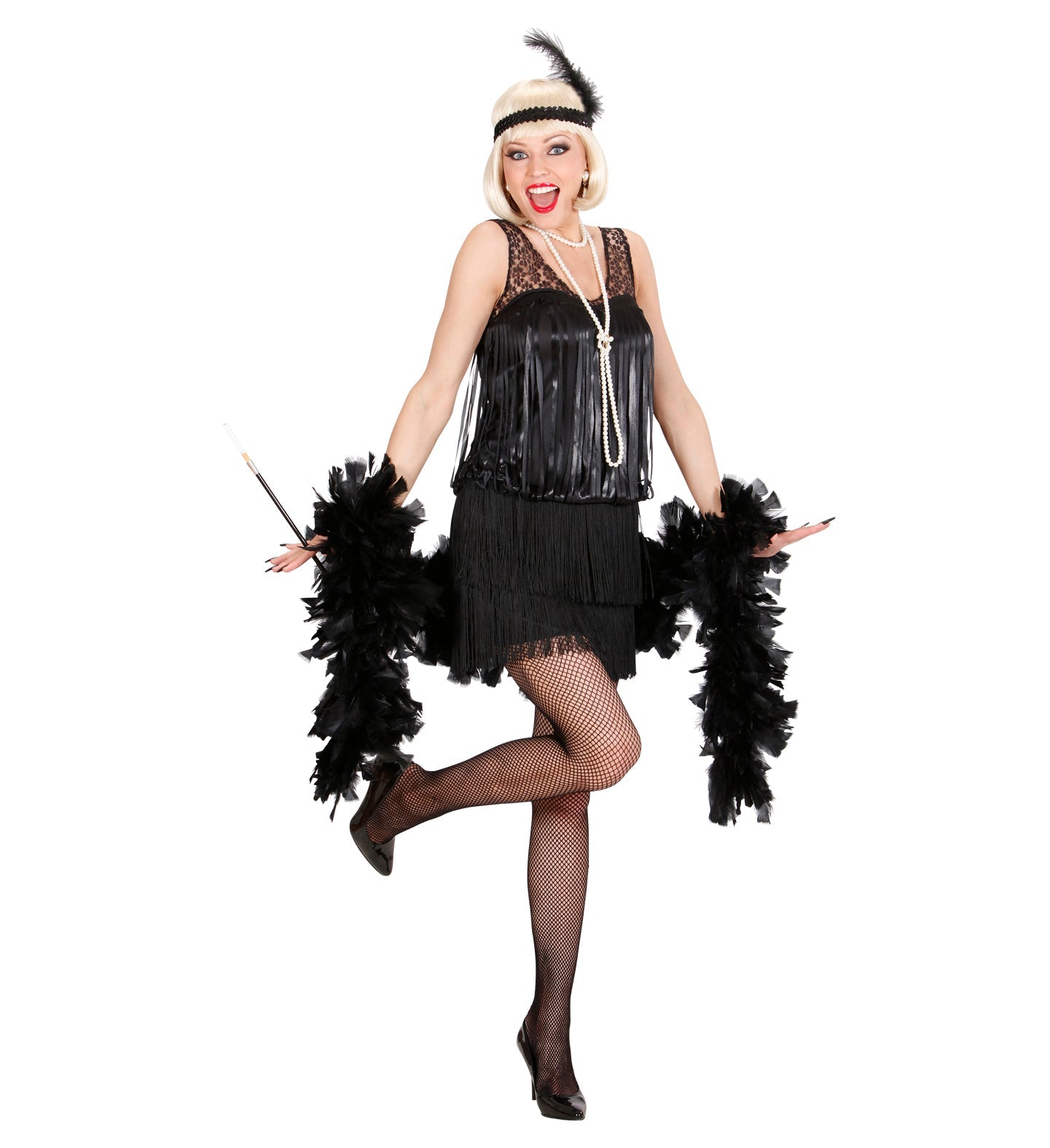 Woman in black fringed Charleston flapper dress and feather headband posing playfully.