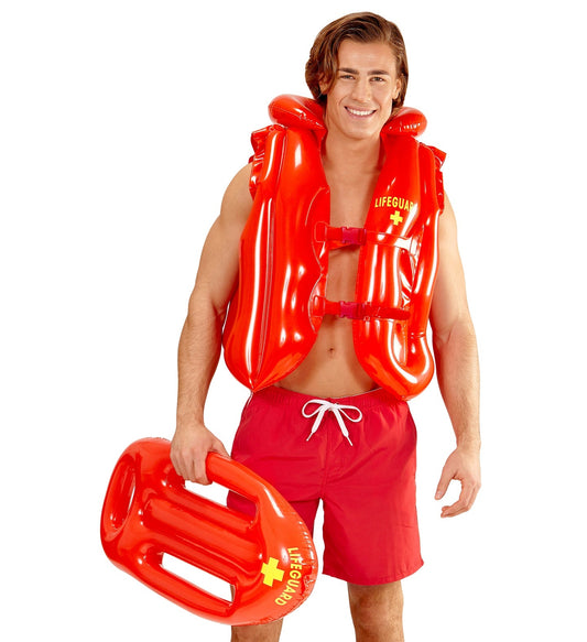 A man in red swim trunks holds a 73cm red inflatable Baywatch rescue buoy.