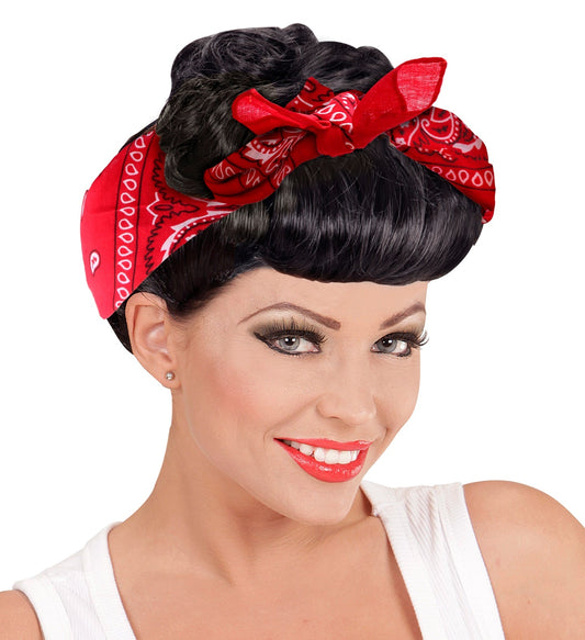 Woman wearing a red bandana headband with pin-up hairstyle.