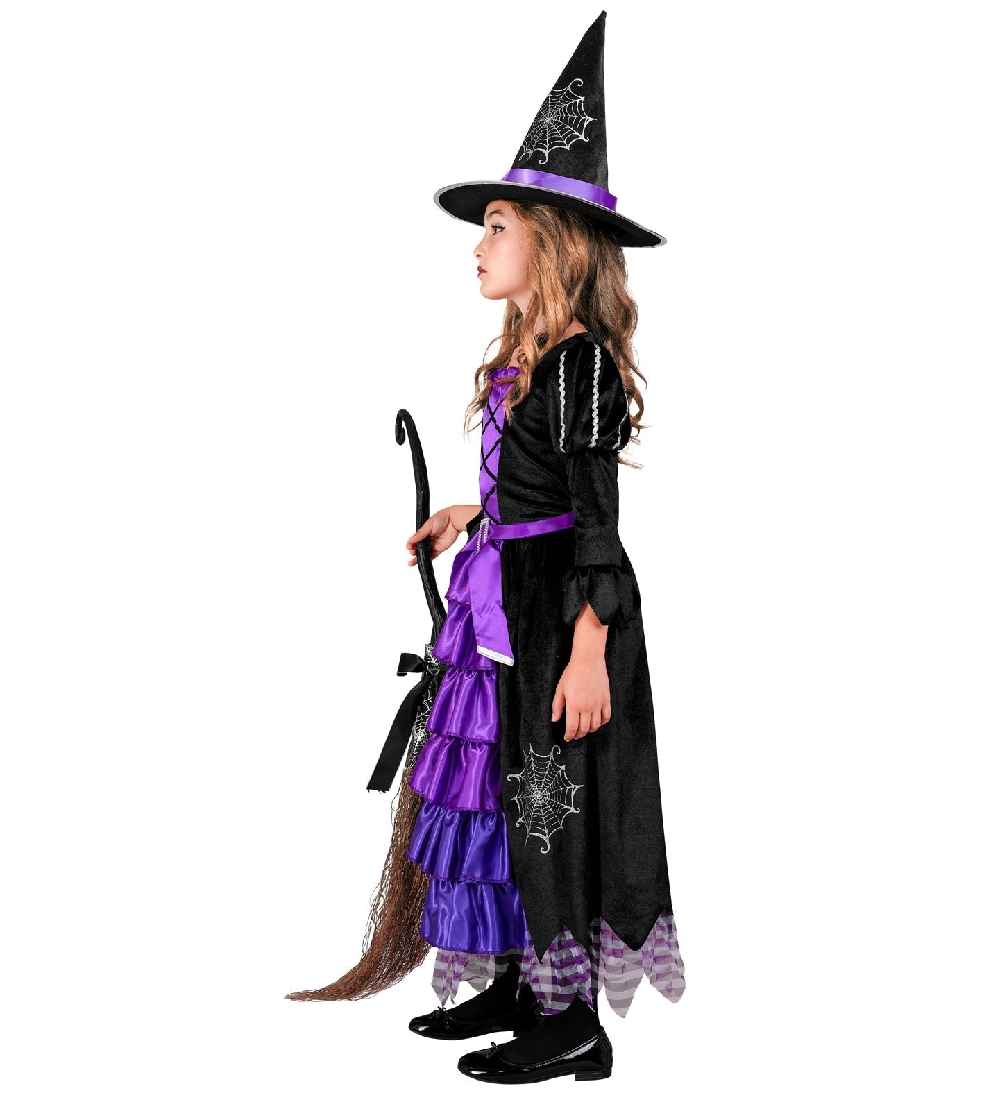 Schwarzes und lila Hexenkostüm für Mädchen mit Kleid, Umhang und spitzem Hut.