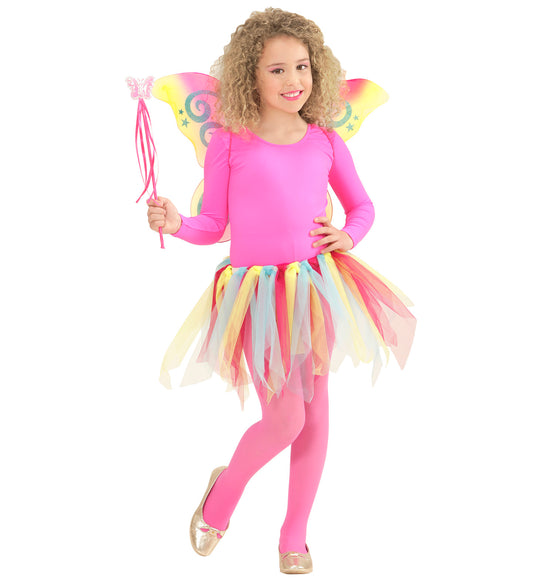 Young girl in pink iridescent fairy costume with tutu, wings, and wand.