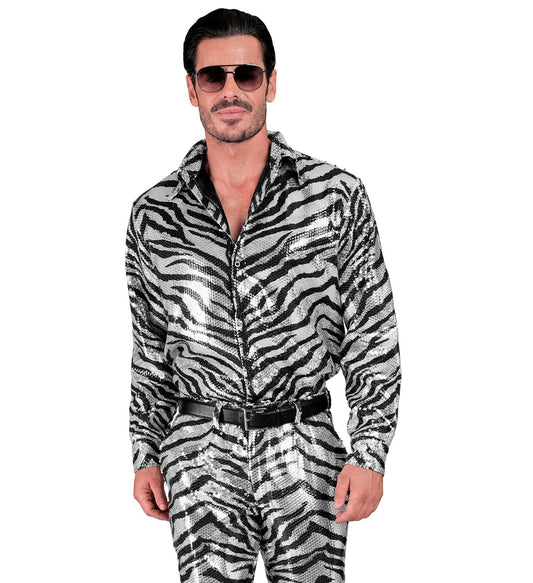 Man wearing black and silver sequin zebra print shirt and pants.