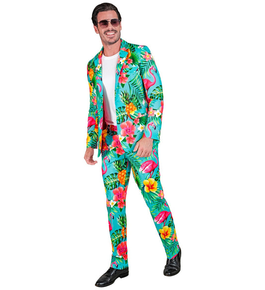 Man in neon green suit with flamingo and palm print, jacket and trousers.