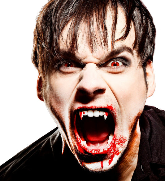 Reusable vampire fangs set with blood capsules and powder for Halloween costumes.