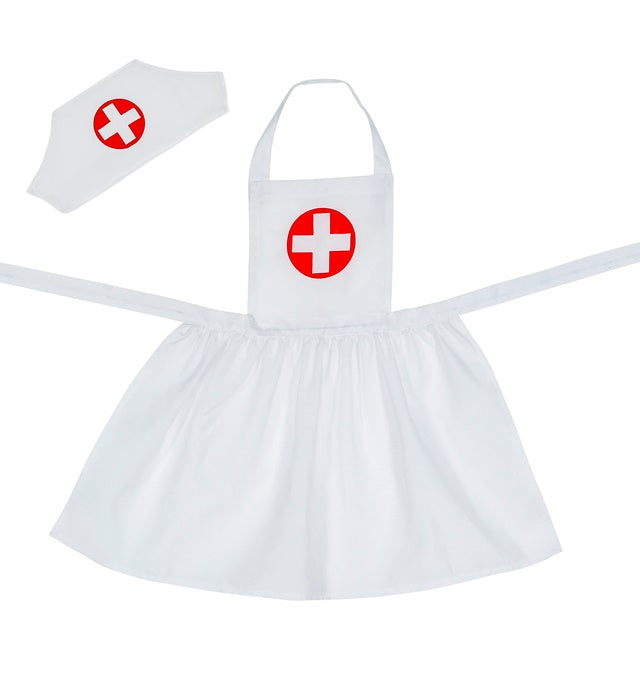 Kind trägt Krankenschwester-Kostüm mit Schürze und Haube für Fasnacht