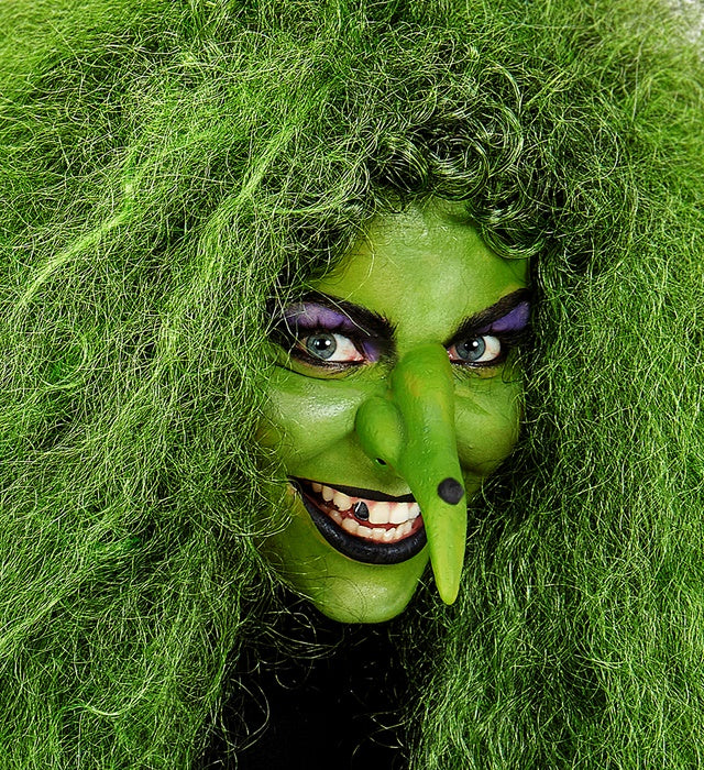 Grünes Make-up in offener Dose zum Schminken bei Fasnacht und Karneval