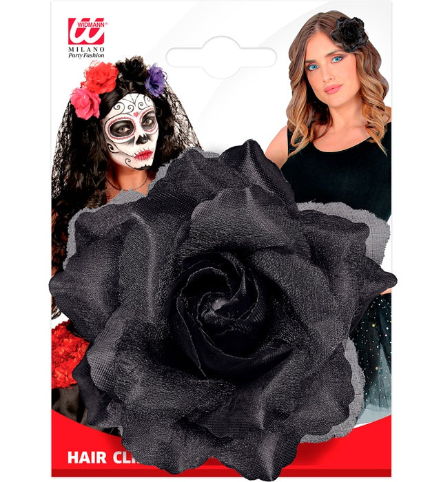 Schwarze Haarspange mit Rosenverzierung auf hellem Hintergrund