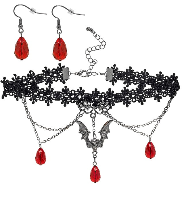 Gotisches schwarzes Vampirin Halsband mit passenden Ohrringen auf schwarzem Hintergrund