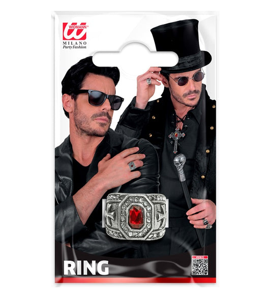 Eleganter Ring mit funkelndem Strass und rotem Edelstein