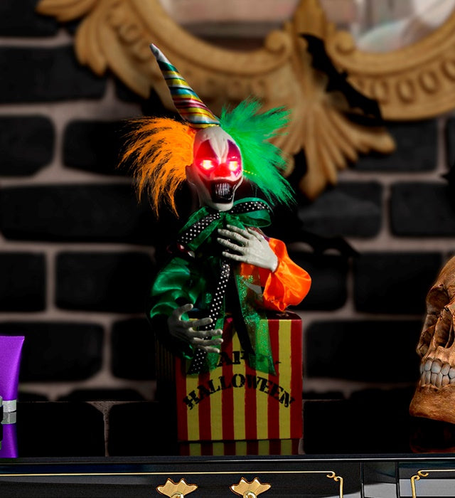 Springender Clown in Kiste mit roten LED-Augen und Zirkusmusik, 37 cm