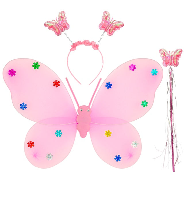 Rosa Schmetterlings-Set mit Flügeln, Haarreif und Zauberstab auf weißem Hintergrund