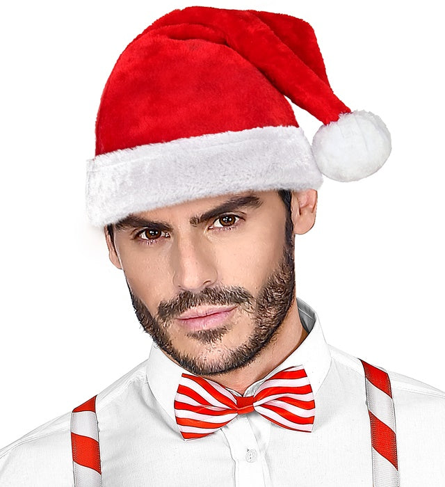 Weihnachtsmannmütze aus rotem Plüsch mit weißem Rand auf neutralem Hintergrund