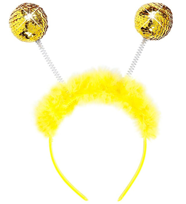 Haarreif mit goldenen Pailletten und gelbem Marabou auf weißem Hintergrund