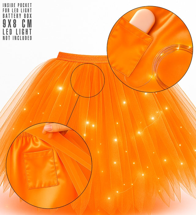 Neon orangefarbenes Tutu mit Innentasche für LED-Lichter auf weißem Hintergrund