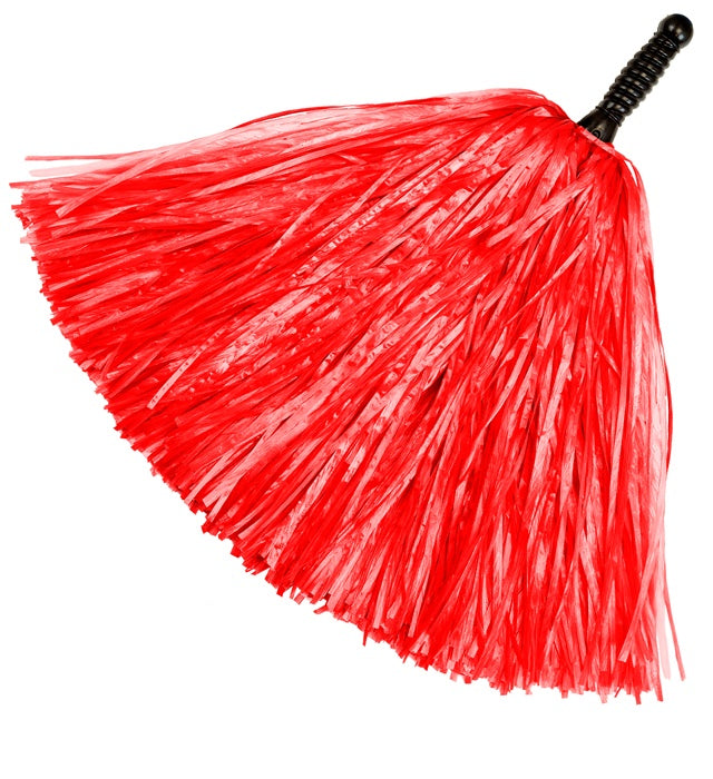 Roter Pompom als farbenfrohes Accessoire für Fasnacht und Karneval