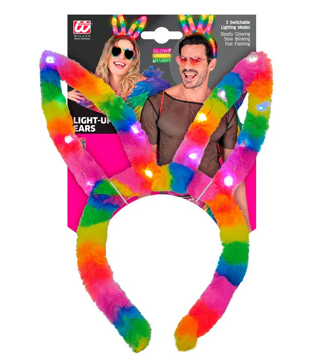 Leuchtende Regenbogen Hasenohren mit LED-Beleuchtung auf schwarzem Hintergrund