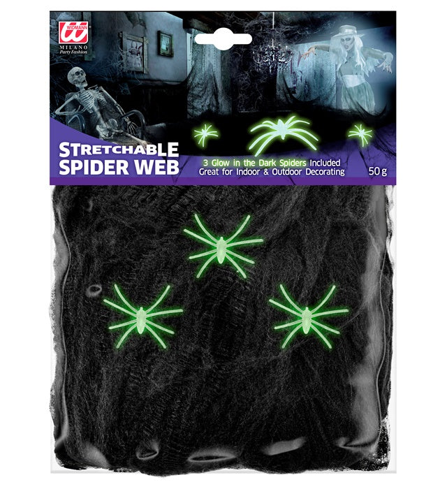 Schwarzes Spinnennetz mit drei phosphoreszierenden Spinnen als Halloween-Dekoration