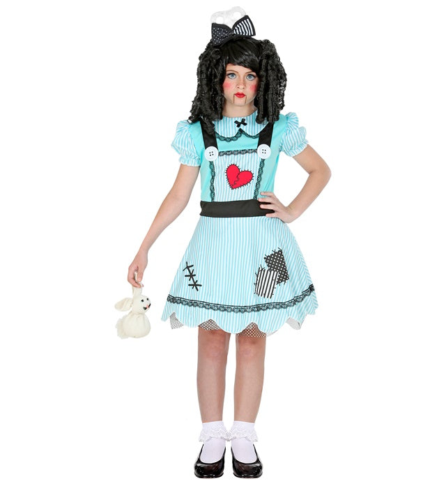 Fasnachtspuppe mit buntem Kleid und roter Haarschleife als Fasnachtsaccessoire