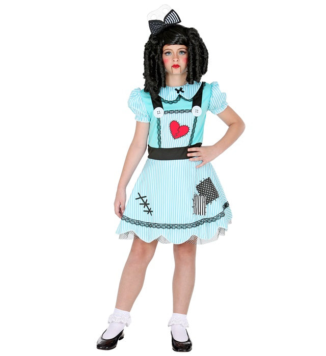 Fasnachtspuppe mit buntem Kleid und roter Haarschleife als Fasnachtsaccessoire