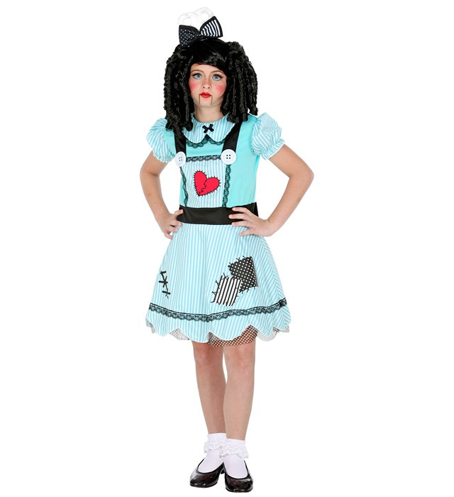 Fasnachtspuppe mit buntem Kleid und roter Haarschleife als Fasnachtsaccessoire
