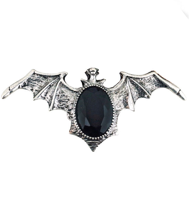 Gotischer Fledermaus Ring mit schwarzem Edelstein auf dunklem Hintergrund
