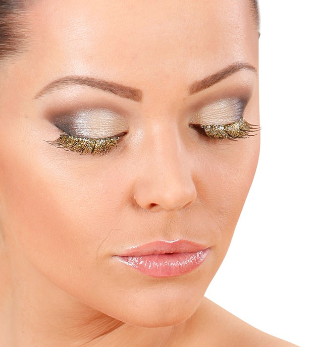 Goldene künstliche Wimpern mit Kleber in Glasflasche für Fasnacht und Mottoparty