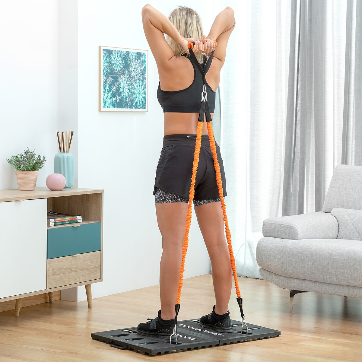 Tragbares Trainingssystem mit Sauna-Sportweste und Zubehör von InnovaGoods – Rückansicht