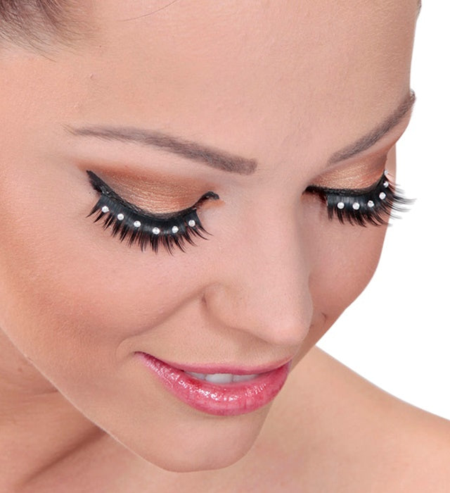 Schwarze Spitzen-Wimpern mit strahlenden Strass-Steinen und Klebstoffflasche