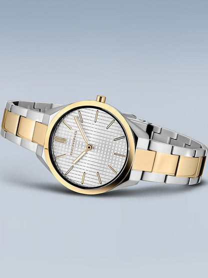 BERING 17231-704 Analoguhr Armbanduhr 31 mm Gold