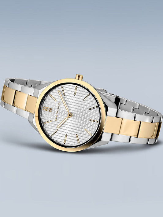 BERING 17231-704 Analoguhr Armbanduhr 31 mm Gold