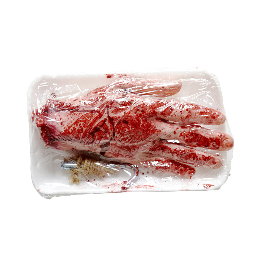 "BLUTIGE ABGESCHNITTENE HAND IN VERPACKUNG" – Vorderansicht