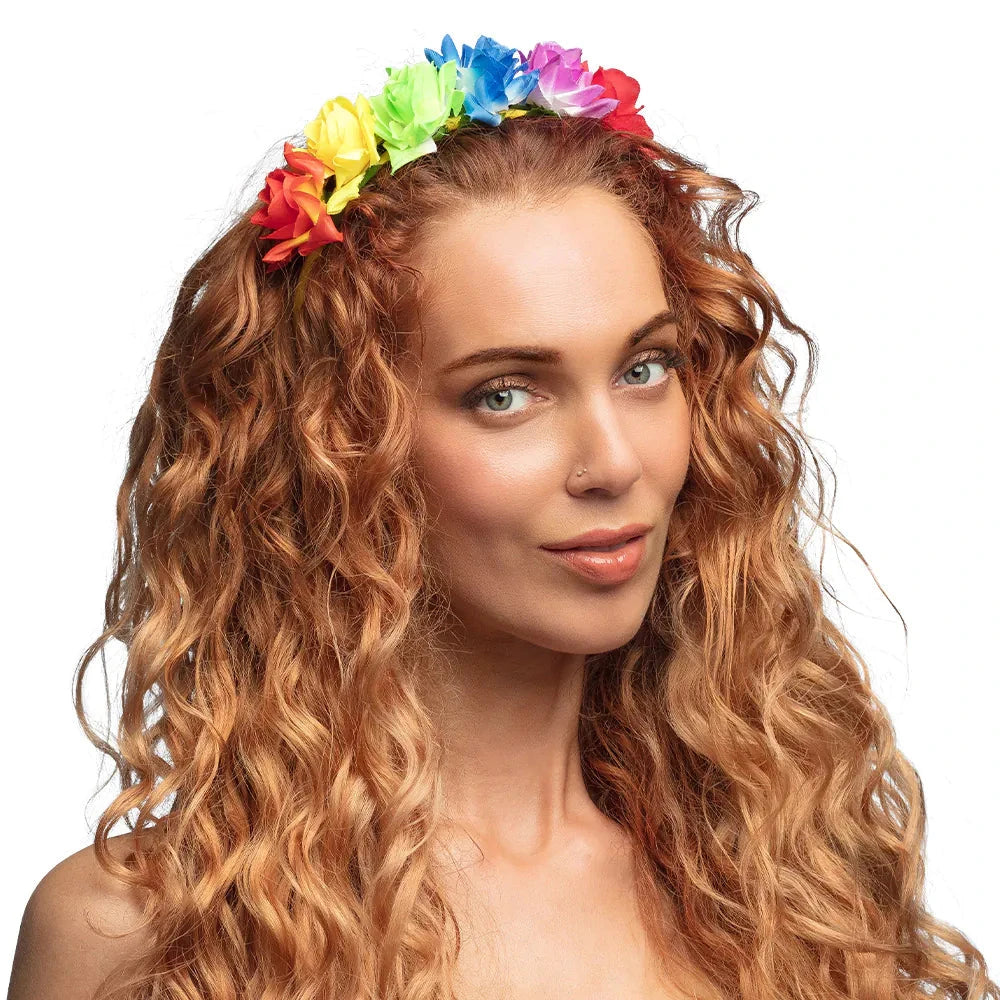 Farbenfrohes Blumenhaarreif mit künstlichen Blumen in leuchtenden Farben auf einem flexiblen Band.