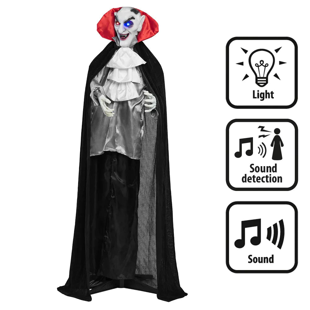Animated laughing vampire decoration with red cape, glowing eyes, motion and sound activation icons.