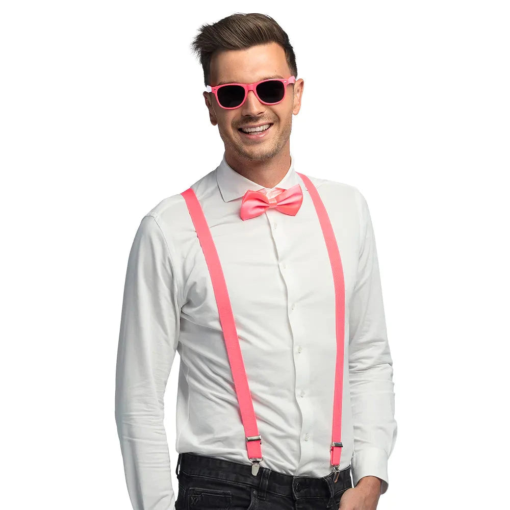 Neonpinke Partybrille, Fliege und Hosenträger in einem Set für festliche Anlässe.