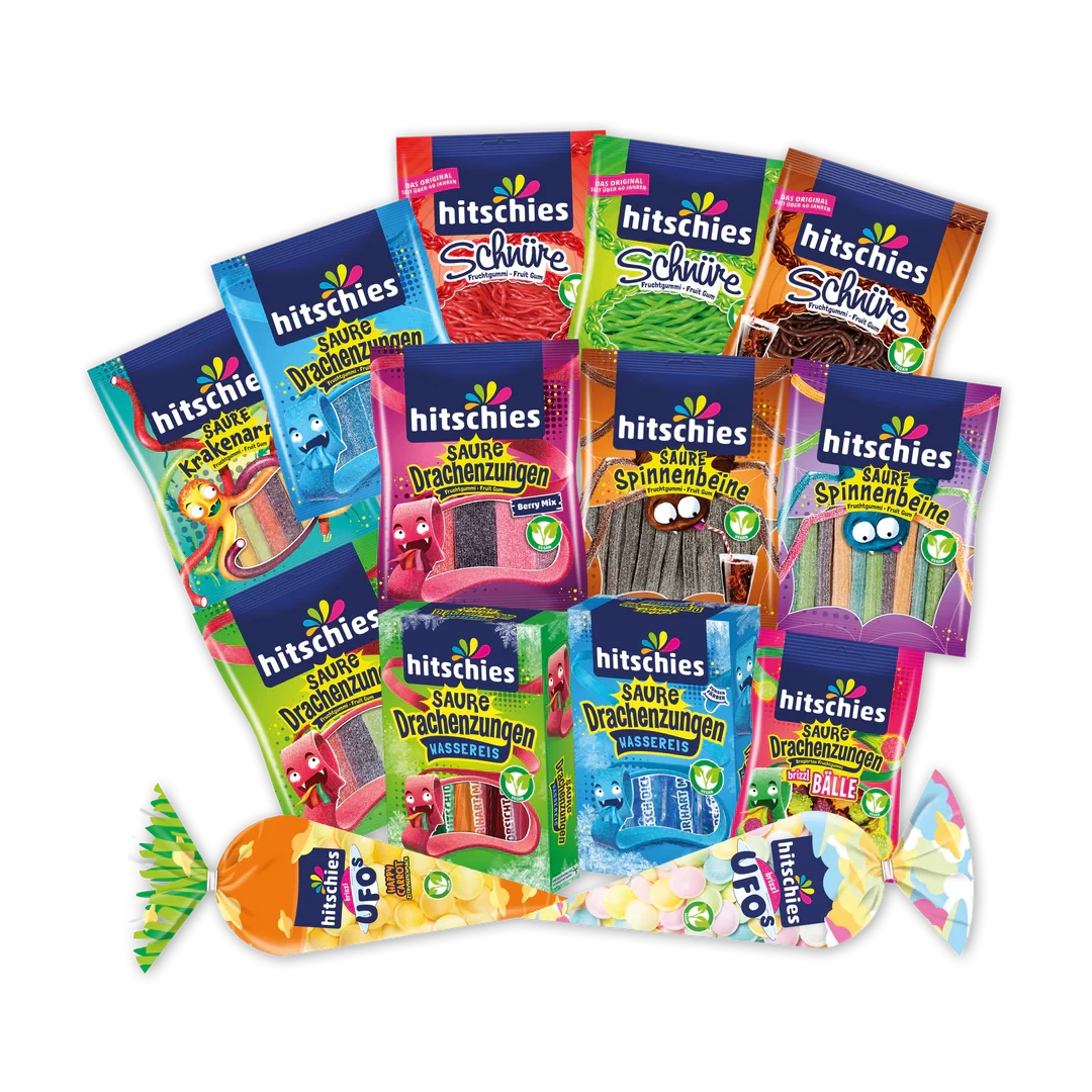 Buntes Bündel mit veganen Fruchtgummis und Wassereis in verschiedenen Farben und Formen.