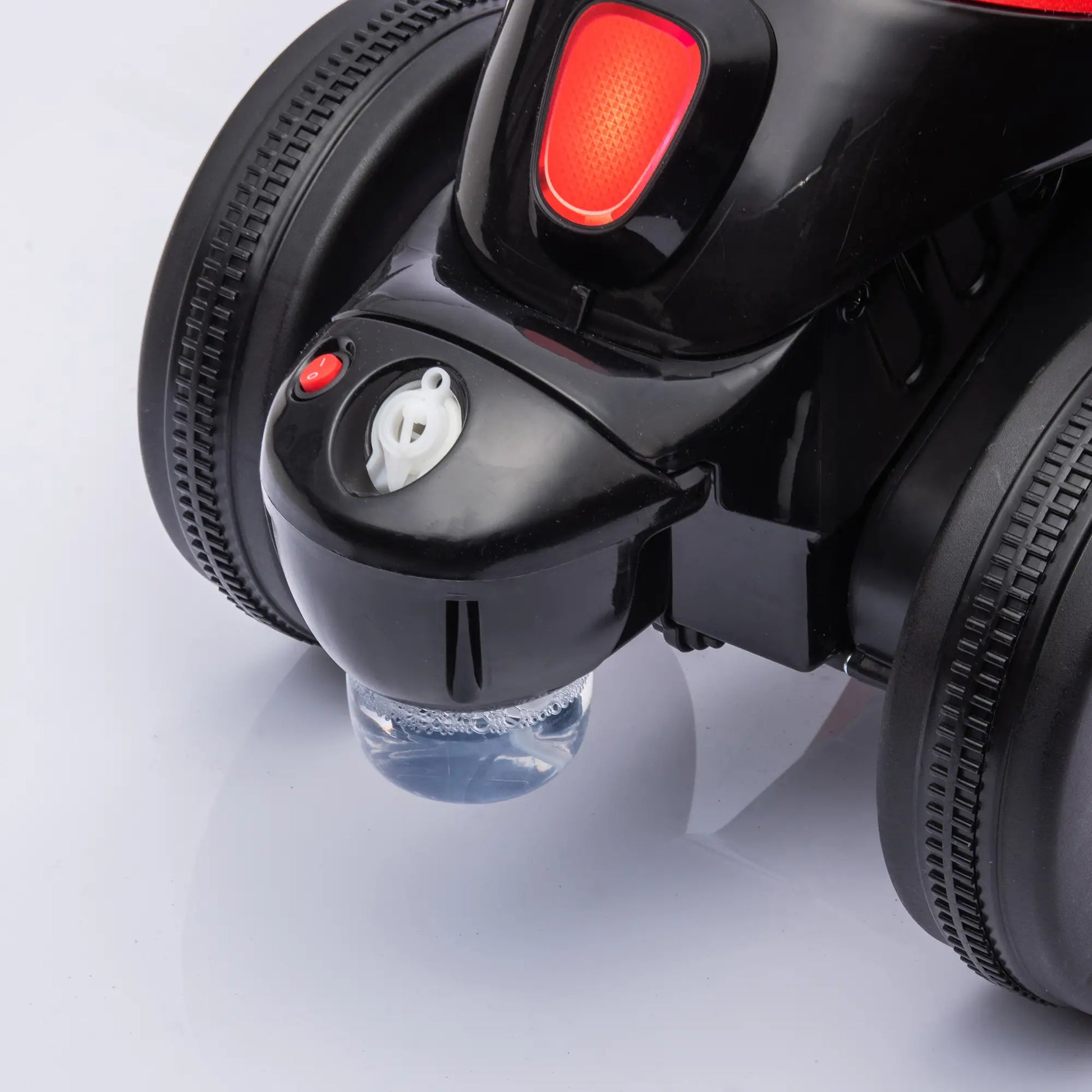 Kinder Elektro-Motorrad in Rot und Schwarz mit Musik- und Seifenblasenfunktion.