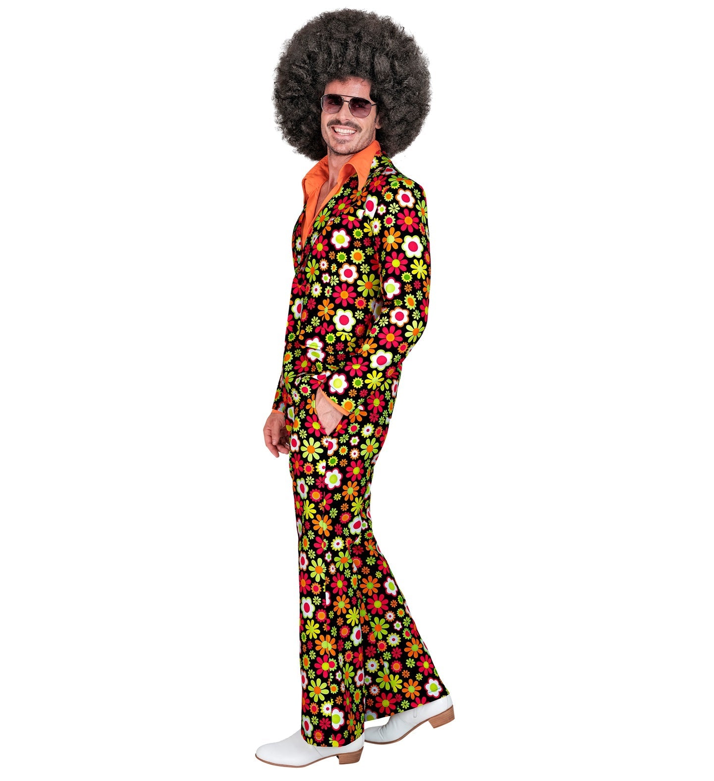 Man in 70s retro disco costume with afro wig, floral suit, and bell-bottom pants.