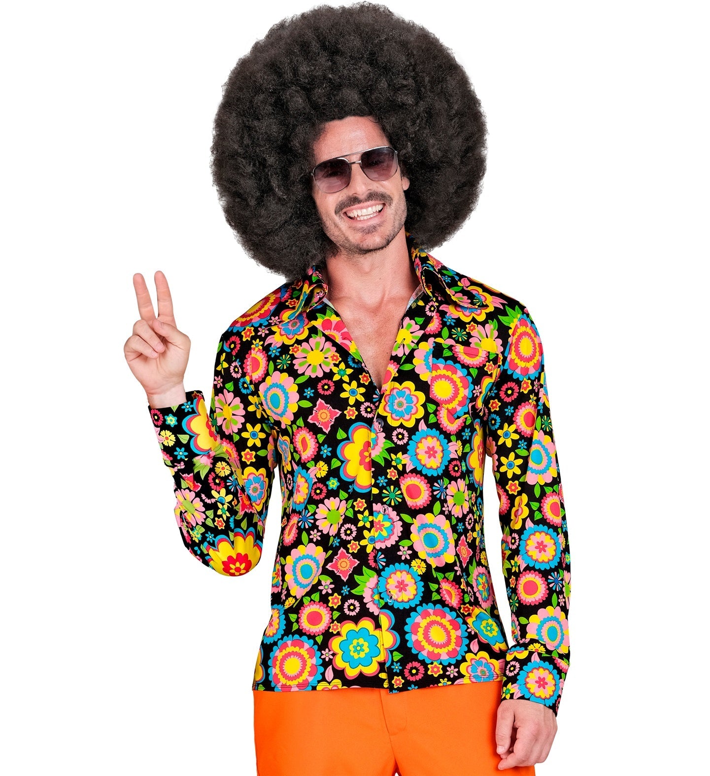 Man in a vibrant floral 70s retro button-up shirt with afro wig and peace sign.