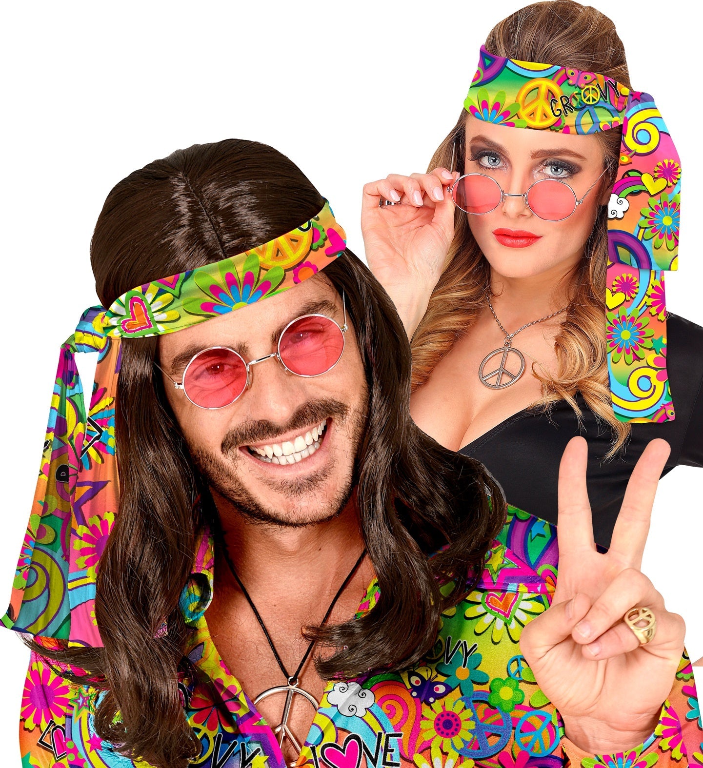 A couple in 70s hippie outfits wearing colorful peace and love headbands, making peace signs.
