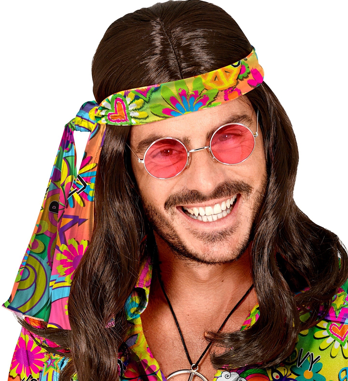 Man wearing a colorful 70s hippie headband with peace symbol and long brown wig.
