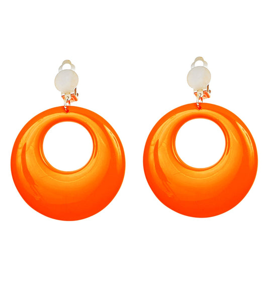 Pair of large neon orange retro plastic hoop earrings with clip backs.