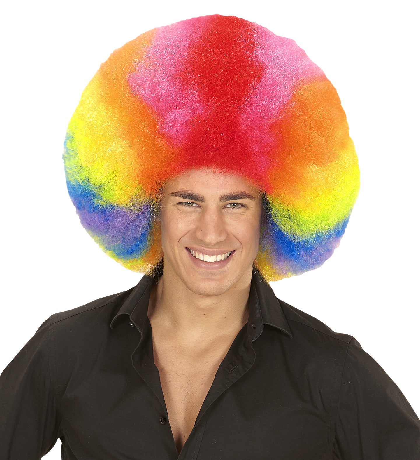 Man wearing a giant rainbow afro wig with fluffy synthetic curls over a black shirt.