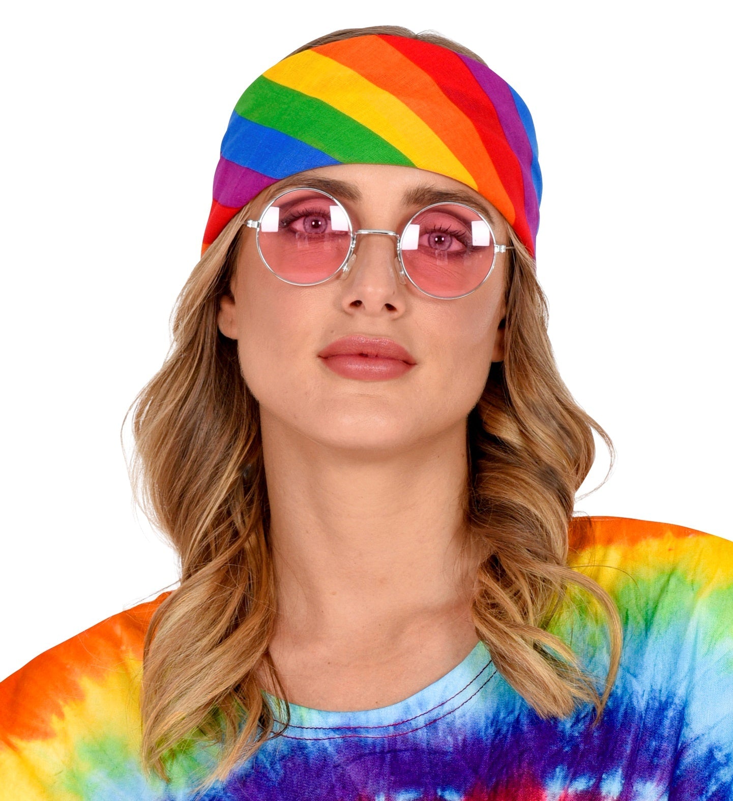 A colorful rainbow cotton bandana tied as a headscarf on a model with blonde hair and pink-tinted glasses.