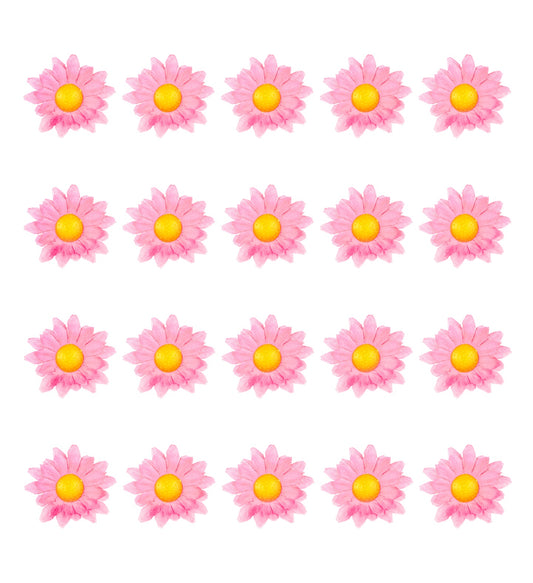 20 rosa Papierblumen in einer braunen Bastelbox für dekorative Akzente im Raum