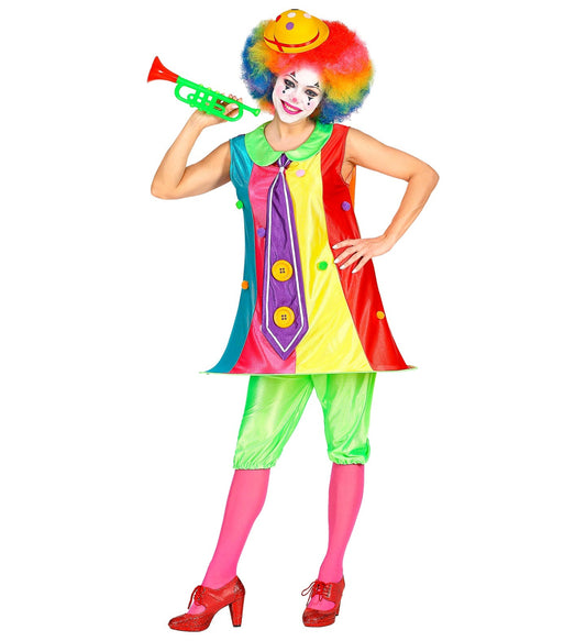 Woman in colorful Widmann clown costume with dress, hoop skirt, trousers, red wig, makeup, trumpet, and pink heels.