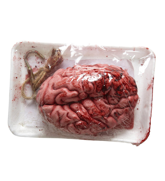 Realistisches, blutiges Gummi-Gehirn für gruselige Halloween-Dekoration auf Tisch und Buffet.